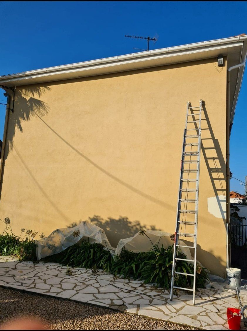 Pose de gouttières et planches de rive